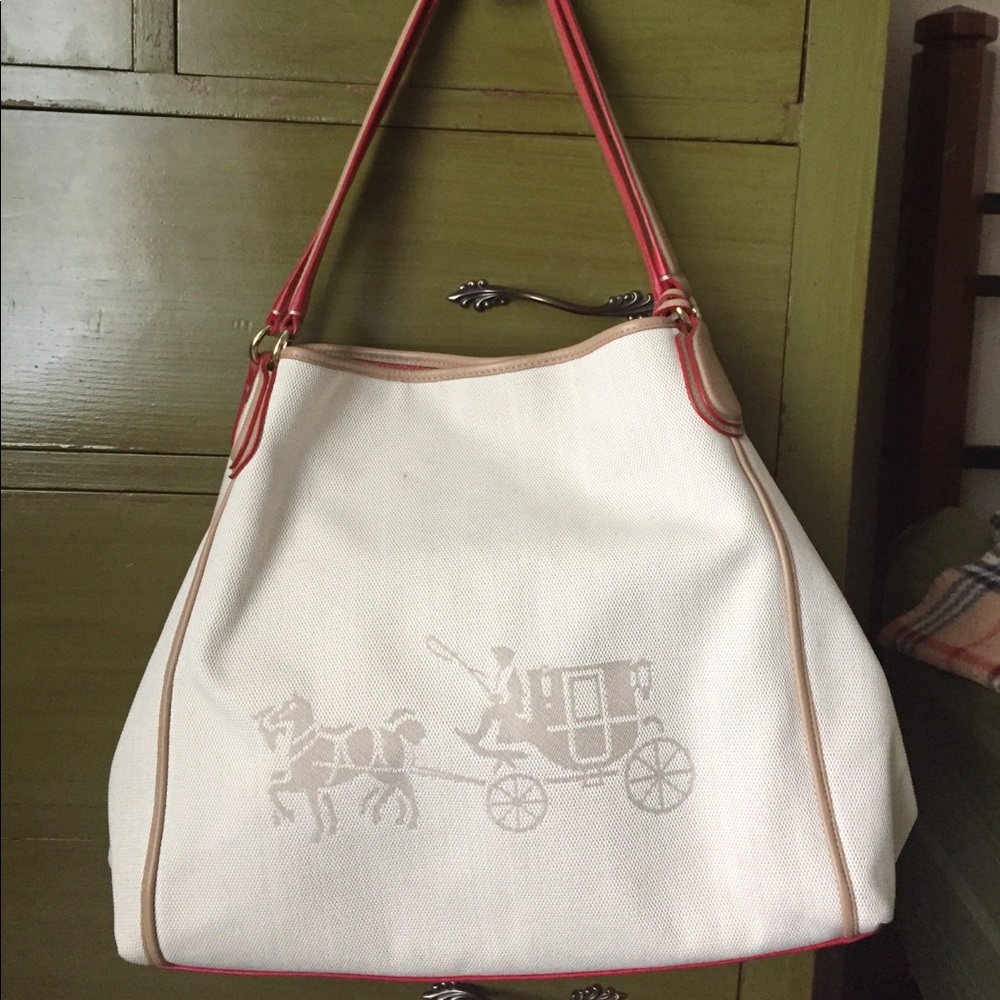 Coach handbag with stagecoach design like new!